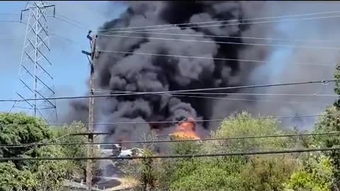 Teen hitting a flaming tennis ball causing a massive fire, power outage in California town