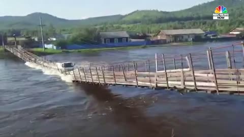 Watch: Bridge Collapse Flips Truck Into Flooded Russian River