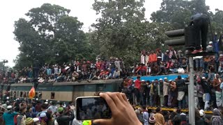 Train Carrying Hordes of Citizens Travels through Dhaka