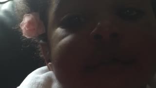 Baby sings with mum