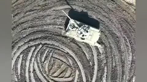 Longer video. Crop circles are not made by UFOs but by the dead crew of a Russian tank.
