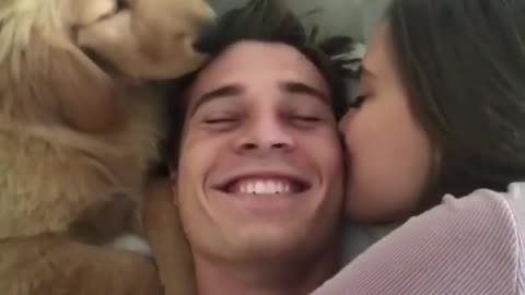 Overloaded kiss with Wife and Dog