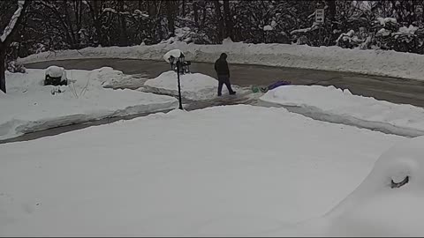 Man Slides Down Icy Driveway and Falls