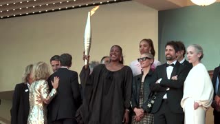 Olympic flame arrives at Cannes Film Festival