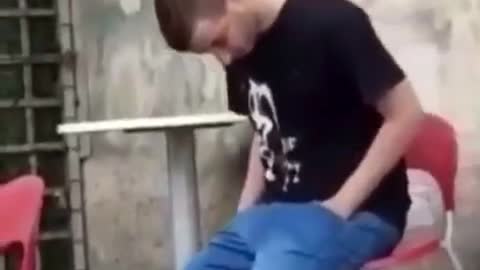 Guy black shirt falling asleep in chair and falling off