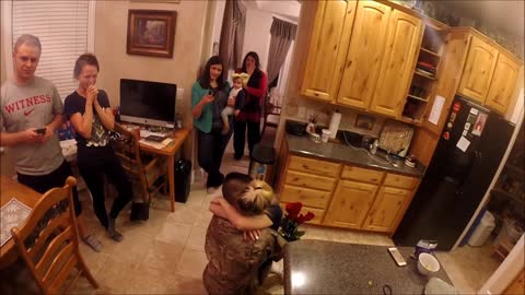 Soldier Surprises Wife And Daughter With Return From Deployment