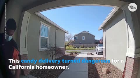 Door camera captures suspect posing as a candy vendor in California home robbery