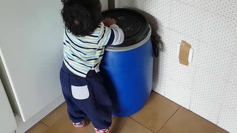 My little kid is trying to move the drum funny video
