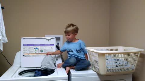 Toddler Doing Laundry Likes Grandma's Underwear