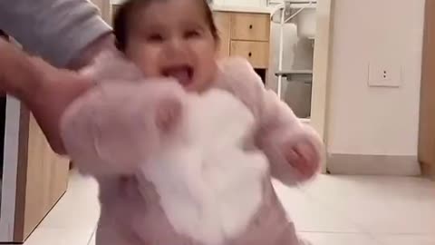 cute baby dancing in bunny costume