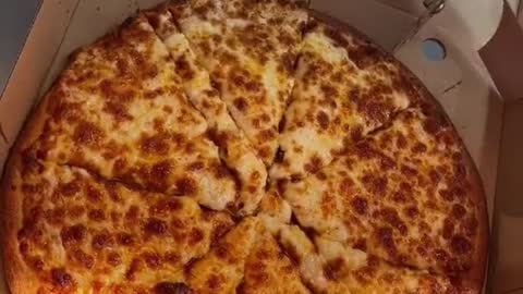 Thin and large sliced cheese pizza with crunch and aroma