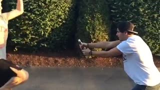 Guy karate kicks a beer open