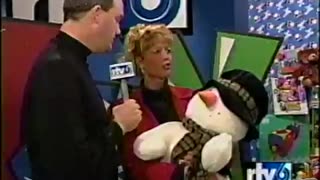 December 3, 2001 - WIBC's Terri Stacy and Jeff Pigeon Assist Toy Drive