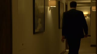 man walking down hotel hallway | hornseywood | hd