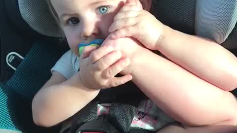 Toddler thinks her foot is a phone
