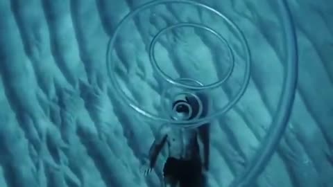 Blowing_a_bubble_rings_underwater___How_cool_is_this__