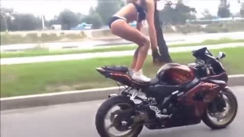 Girl riding a motorcycle #2