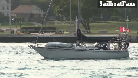 Vertigo I Sailboat Cruising Down St Clair River In Great Lakes