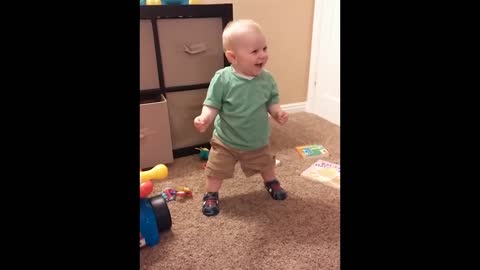 Precious Baby Is Amused By His Squeaky Shoes