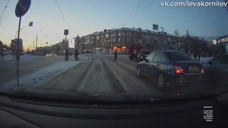 SUV Loses Control and Hits Traffic Light