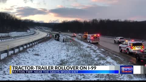 Tractor-trailer rollover reported on I-99