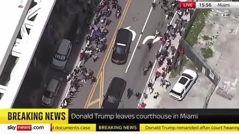 Demonstrator jumps in front of Trump's motorcade as he departed the federal courthouse in Miami