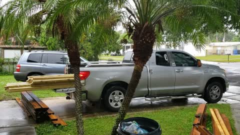 The fastest way to unload lumber in the Florida rain