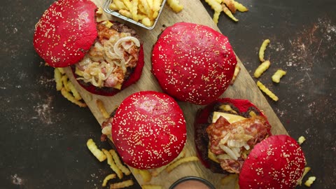 a set of delicious homemade bee hamburgers with red buns