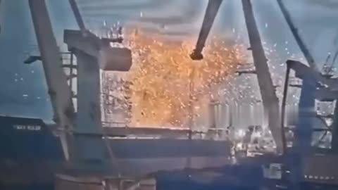 Footage of a cargo ship being hit in one of the ports in the Odessa region