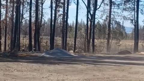 Large Dust Devil Swirls Around House at Job Site