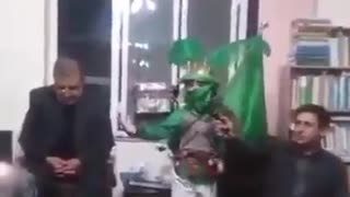 Kid hitting man's head with his toy sword while playing