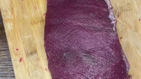 Cleaning up a bottom round roast from a deer