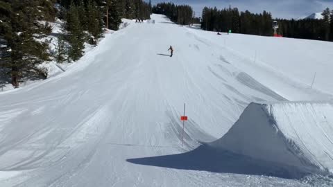 Snowboarder Half Flip Ends With Back Smack