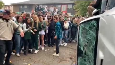 Students Overturn SUV After MichiganState Beats Michigan