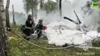 Firefighters extinguish fire at helicopter crash site in Russia