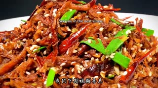 Chinese cuisine recipe, home cooked spicy chicken shreds, golden in color, crispy and delicious