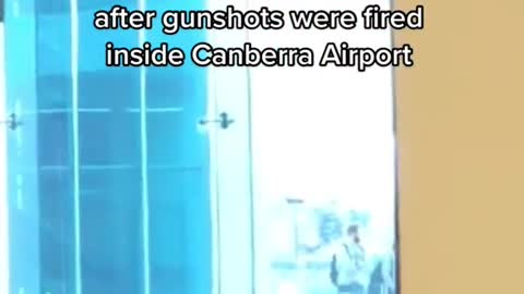 Australian Federal police have detained a man after gunshots were fired inside Canberra Airport