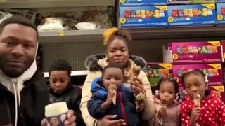 Idiot Black Father Eats Snacks Off The Floor Of A Grocery Store With His Baby Mom & Children!