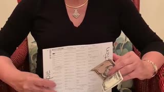Woman offered 5 USD to vote for Biden
