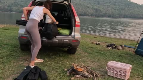 Solo overnight camping - young beauty girl in wild mountains