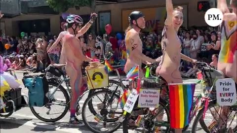 Fully-naked adults riding bikes EXPOSE THEIR GENETILIA TO CHILDREN at Seattle Pride...