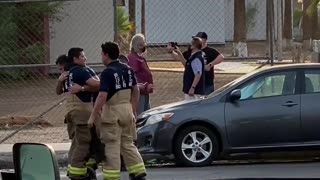 Firefighters Extinguish Burning Bus