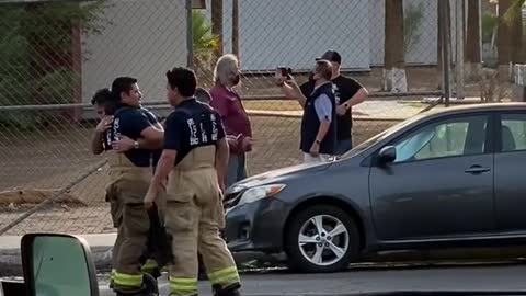 Firefighters Extinguish Burning Bus