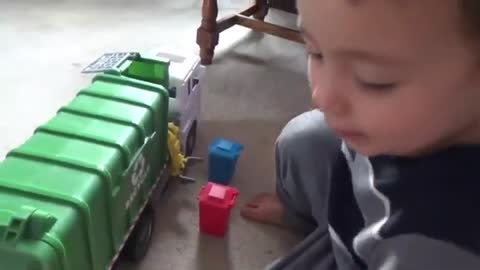 Kid's play with his recycled garbage truck, connect with Lights & Sound