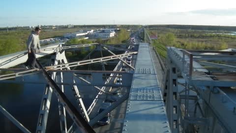 Front-Flip On Bridge Over Moving Traffic