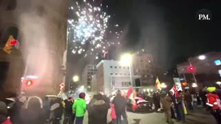 The scene outside Parliament Hill, complete with honking and fireworks.