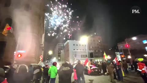 The scene outside Parliament Hill, complete with honking and fireworks.