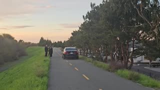 Car Speeds Down Pedestrian Trail