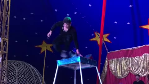Circus Performer Drops Pole On Man's Head