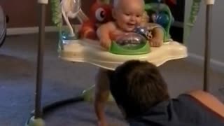 Baby Laughs at Dad